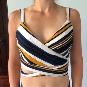 A blue, white, and yellow striped crop top.
